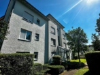 Hausansicht - Vermietete 3,5 Zimmer Wohnung mit Tageslichtbad und Garten!